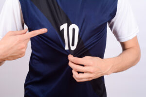 Soccer player pointing to number 10